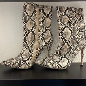 Fashion Nova Black and Cream Snakeskin Heeled Boots